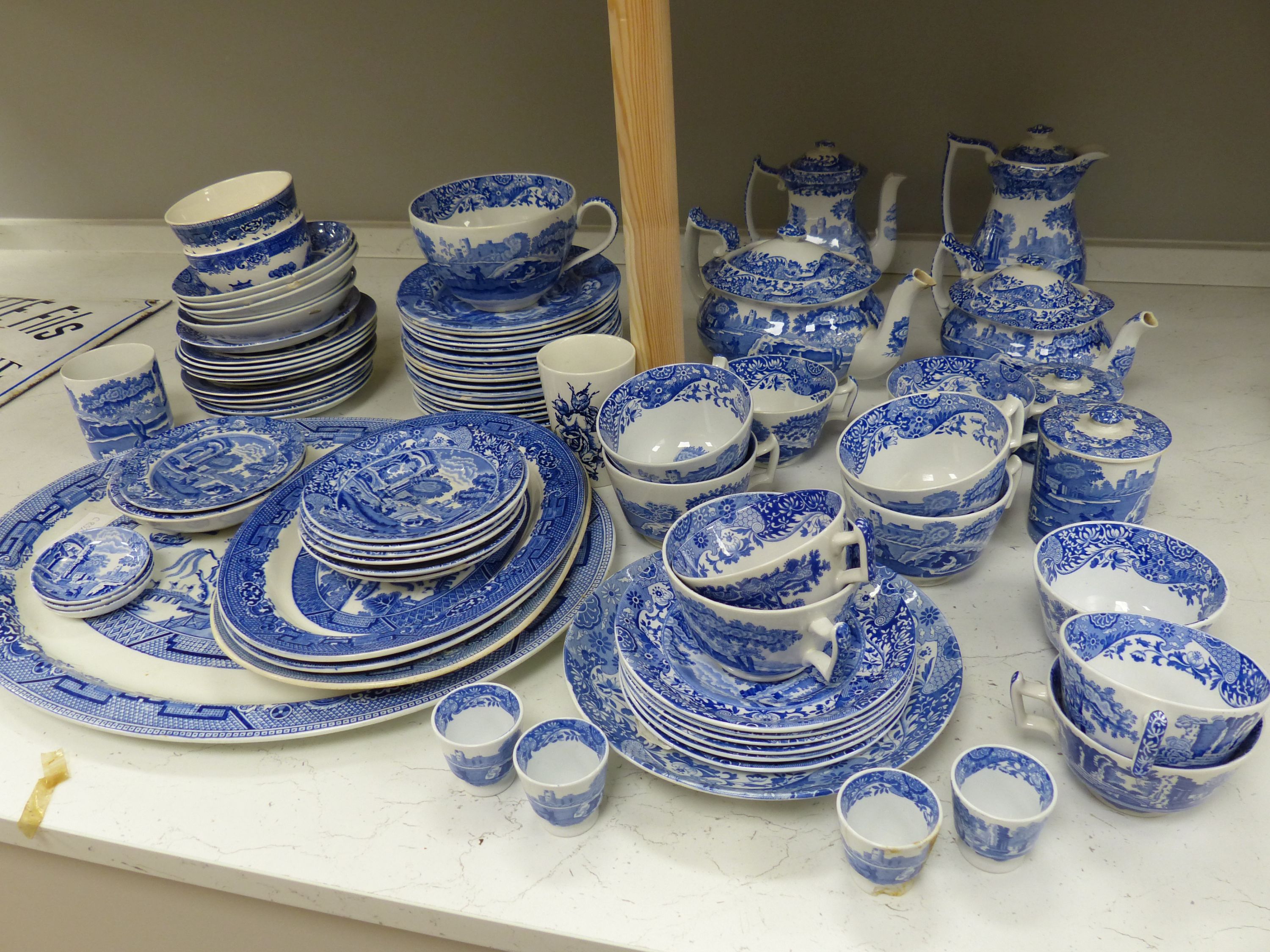 A quantity of blue and white ceramics including Copeland Spodes Italian and Willow pattern